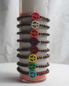 Dress to impress with this handmade stretch bracelet! Its wood beads and hand-crafted stone peace sign provide a chic, boho vibe, perfect for any occasion. Accessorize the easy way and spread peace and love with the Gala Bracelet! Yellow Turquoise, Canvas Painting Designs, Turquoise And Purple, Painting Designs, Boho Vibe, Peace Sign, Paint Designs, Stretch Bracelet, Wood Beads