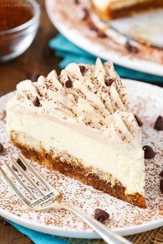 there is a piece of cake on the plate with a fork and spoon next to it