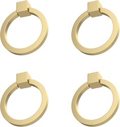 four gold rings with square handles on each one, all in different shapes and sizes