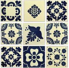 nine blue and white tile designs with flowers, leaves, and hearts on the sides