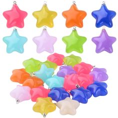 many different colored stars are in the shape of bell bells on a white background with clippings