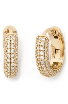 Sparkling and timeless, these eye-catching huggie hoops are adorned with pavé crystals that are available in a range of vibrant colors. 1/2" hoop diameter; 1/8" width Snap-post closure Goldtone or silvertone plate/crystal Imported Kate Spade Earrings, Stacked Jewelry, Round Stud Earrings, Huggie Hoop Earrings