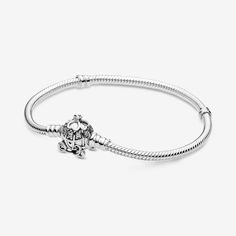 Make a wish with the Disney Cinderella Pumpkin Coach Clasp Pandora Moments Bracelet. Hand-finished in sterling silver, celebrate the 70th anniversary of Disney’s Cinderella with this bracelet. This piece features a pumpkin carriage with stone settings for windows, four hearts that form a clover and a 3D crown on the roof, a grooved heart for a door handle and pumpkin wheels. With the Pandora and Disney logos on the back, attach your favorite Disney x Pandora charms to this bracelet for a magical Pandora Moments Bracelet, Charms Disney, Pumpkin Coach, Cinderella Pumpkin, Disney Logo, Pumpkin Carriage, Pandora Disney, Disney Cinderella, Bracelet Pandora