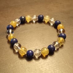 Zeus Beaded Bracelet Made with rutilated quartz, clear quartz & lapis lazuli to represent the God of the Sky. Rutilated Quartz, Clear Quartz, Lapis Lazuli, Arm Band, Bracelet Making, Beaded Bracelet, The Sky, Jewelry Bracelets, Etsy Accessories