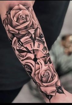 a person with a clock and roses tattoo on their arm