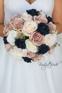 a bridal holding a bouquet of pink and blue flowers on her wedding day,