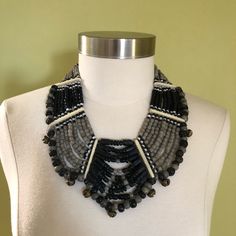 "This glass beaded black and gray scalloped collar necklace packs a style punch. Elevate any outfit with this statement necklace. It measure 20\" long with a 4\" drop on the front." Tuareg Jewelry, Scalloped Collar, Statement Collar, Vintage Bangles, Multi Strand Bracelet, Buckle Bracelet, Pin Pendant, Threader Earrings, Boho Festival