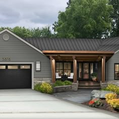 this is an artist's rendering of a house in the country style with two car garages