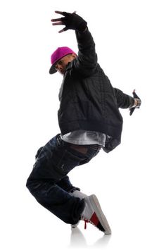 a man in black jacket and pink hat doing a trick on skateboard with one hand