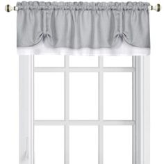 a window with white curtains and windowsills