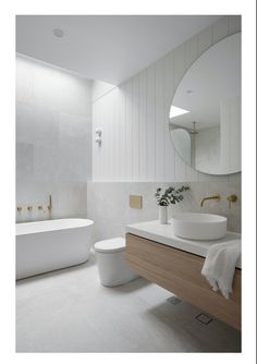 a bathroom with a sink, toilet and bathtub is shown in this image from the front view