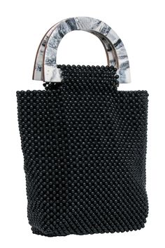 This oh so chic Cleobella black beaded handbag with marble handles is sure to turn heads! Put the perfect finishing touch on your date night or vacation beach dinner ensemble by styling this black beaded beauty with a slip dress and heels. Get ready to be a stunner! Upper 100% Glass Lining 100% Cotton Magnetic middle closure One interior slip pocket Height 11" Width 12" Depth 4" Handle drop 4" Summer Black Shoulder Bag With Round Handle, Summer Evening Bag With Beads, Black Shoulder Bag For Summer Evenings, Black Shoulder Bag For Evening In Summer, Elegant Black Summer Bags, Chic Beaded Shoulder Bag For Summer, Black Shoulder Bag For Summer Party, Elegant Black Shoulder Bag For Vacation, Black Party Bag For Summer