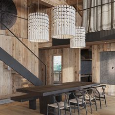 a dining room table with chairs and chandelier hanging from the ceiling