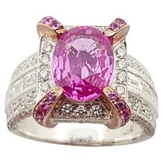 Pink Sapphire 3.33 carats, Pink Sapphire 0.31 carat with Diamond 1.54 carats Ring set in 18 Karat White Gold Settings Width: 1.1 cm Length: 1.3 cm Ring Size: 52 Total Weight: 10.0 grams "We first opened doors in 1980 when it was then situated in the vicinity of the Victory Monument; a small and modest storefront with a couple of counters. From its humble beginnings to where it stands today, our company has proven its abilities as a jeweler. Since the beginning, we have been supplying fine qualit Luxury Gia Certified Pink Sapphire Diamond Ring, Gia Certified Pink Sapphire Rings For Formal Occasions, Pink Sapphire Diamond Ring, Zipper Jewelry, Solitaire Ring Set, Sapphire Solitaire Ring, Blue Sapphire Necklace, Silver Opal Ring, Edwardian Jewelry