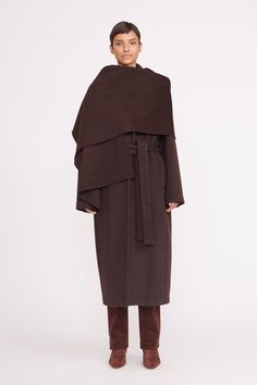 A long wool coat essential for the colder seasons. The Carver Coat features an exaggerated collar and lapels, tie belt, and removable oversized wool scarf. Scarf Coat, Exaggerated Collar, Long Wool Coat, Classic Coats, Collared Coat, Cold Season, Wool Scarf, Tie Belt, Synthetic Fiber