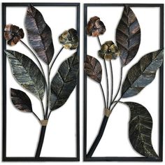 two metal wall art pieces with leaves and flowers on them, one is black and the other is brown