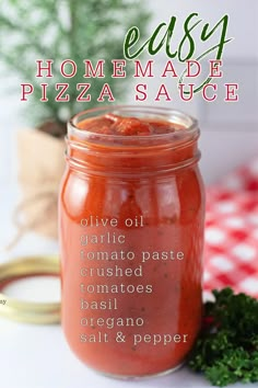 homemade pizza sauce recipe in a jar with ingredients