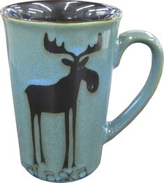 a coffee cup with a moose design on the bottom and inside is shown in blue