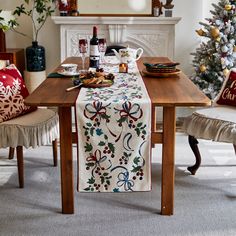 a dining room table with christmas decorations on it