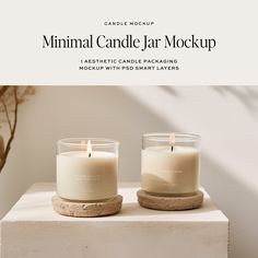 two candles sitting next to each other on top of a white block with text that reads minimal candle jar mockup