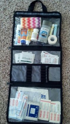 an open travel bag filled with medical supplies