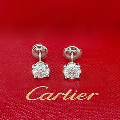 Cartier 1895 Round Brilliant Diamonds Stud Earrings Style:  4 Prong Stud Earrings Ref. number:  N8515231 Metal:   Platinum PT950 TCW:  2.05 tcw Main Diamond:   1.  RBD 1.02 G VS1 GIA 6137445147    2.  RBD 1.03 H VS1 GIA 2135220814 Hallmark:  Cartier PT950 on backs of settings Includes:  Cartier Earring Box, Jewelry Pouch & Copies of GIA Diamond Certificates Retail:  ~ $40,000.00 SKU#137260TZK032024KF Return Policy: Returns accepted up to 14 days.     Payment Information:  We accept payment by PayPal    International Buyers:  Buyer is responsible for any customs fees or duties incurred by their country based on their country's rules & regulation no exceptions! We do not declare items of a lower value or mark any items as gift.  Shipping: We ship via FED-EX Priority Overnight with Full Insur Cartier 1895, Cartier Diamond, Cartier Earrings, Diamond Earrings Studs Round, Earring Box, Diamond Stud Earrings, Box Jewelry, Diamond Stud, Fine Jewellery Earrings