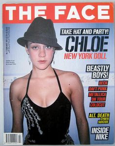 a magazine cover with a young woman wearing a black top and hat on the front