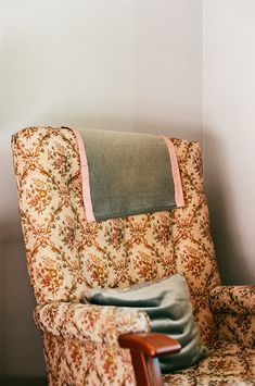 a chair with a pillow on top of it