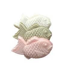 three fish shaped soaps sitting on top of each other