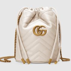 *Brand New* Gucci Gg Marmont Mini Bucket Bag In White Leather + Dust Bag With (Unattached) Tags Product Details Style 575163 Dtdrt 9022 A Mini Bucket Bag Presented In White Matelass Leather With A Heart Detail On The Back. The Gg Marmont Collection Is Defined By The Emblematic Double G Hardwarea Contemporary Take On A Gucci Archival Belt Buckle From The '70s That Has Become A Hallmark Of The House. Completed By A Gold-Toned Chain Strap, The Dynamic Shape Can Be Worn In Multiple Ways. White Matel Gg Marmont Mini Bucket Bag, Gucci Bucket Bag, Gucci Gg Marmont Matelasse, Gucci Gg Marmont Mini, Gg Marmont Mini, Gucci Mini, Mini Bucket Bag, Mini Bucket Bags, Mini Bucket