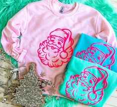 Pink Gildan sweatshirt Mint and Scuba Blue are Jerzees Vinyl Sweatshirt Ideas, Puff Vinyl, Santa Sweatshirt, Retro Santa, Gildan Sweatshirt, Gildan Sweatshirts, Pink Design, Unisex Tshirt, Retro Vibe