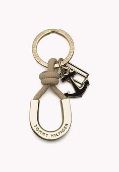 a metal keychain with an anchor and rope on the end that says, mighty mail