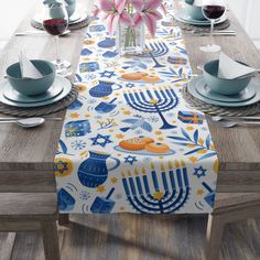 the table is set with blue and white dishes