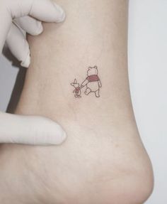 a person with a small tattoo on their foot