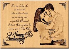 an engraved wooden plaque with the words happy anniversary and a photo of a couple kissing