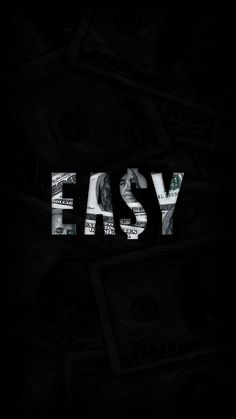 the word easy written in dollar bills on a black background with white lettering that reads easy