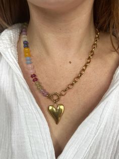 Add a touch of style to your accessories with this gorgeous multi-coloured necklace! Made from thick, chunky glass beads, this necklace is a real eye-catcher that will brighten up any outfit. The fresh colour combination creates a unique look. At the bottom hangs an elegant stainless steel heart, which adds a nice accent and gives the necklace a playful touch. With a length of 46 cm, this necklace is perfect for both casual and festive looks. Features: Material: Glass beads, stainless steel hear Chunky Bead Necklace, Handmade Beaded Necklace, Chunky Bead Necklaces, Handmade Beaded Necklaces, Chunky Beads, Colour Combination, Colourful Necklace, Bead Necklace, Favorite Jewelry