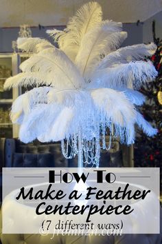 a white feather centerpiece with the words how to make a feather centerpiece