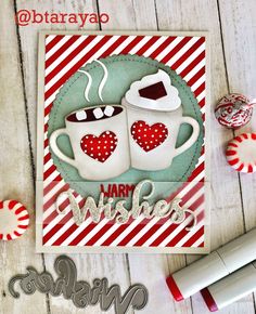 a card with two cups of coffee on it and candy canes next to it