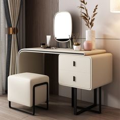 a white dressing table with a mirror and stool