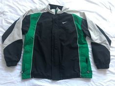 Vintage Nike Storm Fit White Tag Windbreaker Track Jacket Running Size L Green. Shipped with USPS Priority Mail. See pics: Zipper is hard to get up as the bottom part as seen in pics is a little loose. Also zipper original plastic handle is broke per the pics as well. Sleeves on the gray part have some light markings and tried to show this with pictures as well, overall good condition for the years it’s been in :). 90s Green Sports Outerwear, Green Nike Track Jacket For Streetwear, Vintage Nike Jacket, Nike Accessories, The Gray, Track Jacket, Track Jackets, Vintage Nike, Get Up