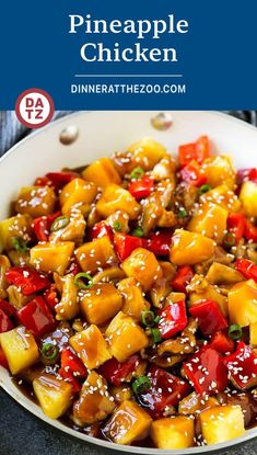 pineapple chicken with sesame seeds in a white bowl