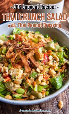 thai crunch salad with peanut dressing in a bowl