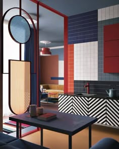 a kitchen with red, white and blue tiles on the wall next to a sink