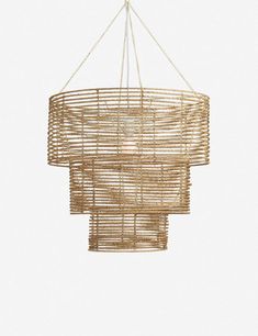 a chandelier made out of bamboo sticks and rope hanging from a ceiling fixture