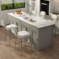 a large kitchen island with chairs around it