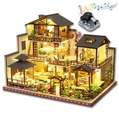 an image of a doll house with lights and music