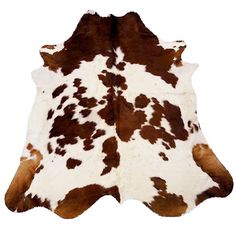 a brown and white cowhide rug on a white background