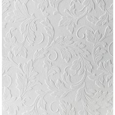 white wallpaper with an intricate design on it's surface and the background is painted in