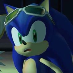 sonic the hedgehog is wearing goggles and staring at something